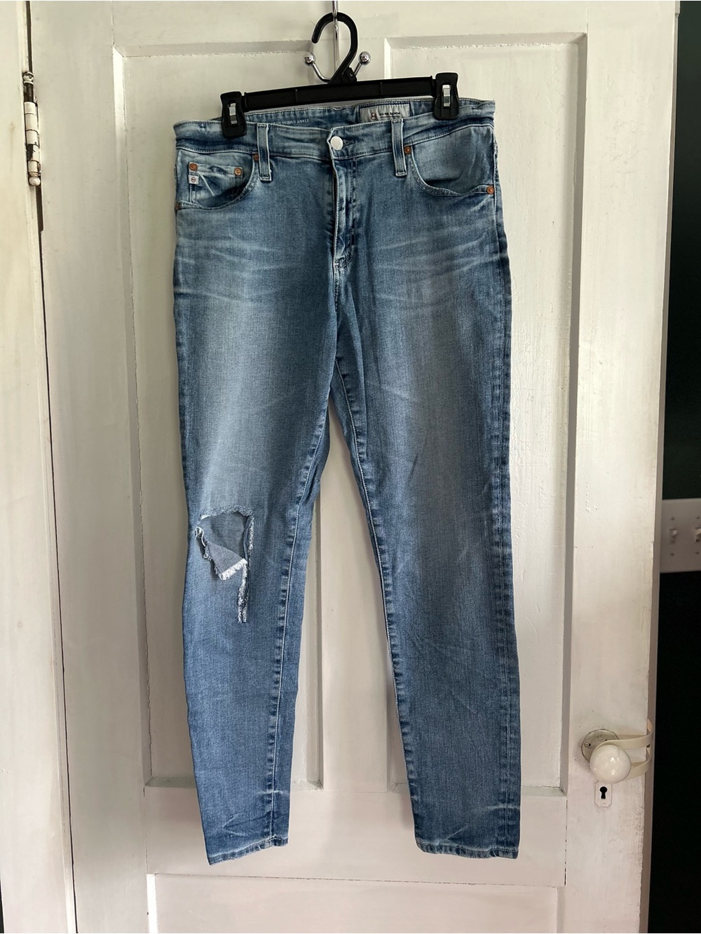 Light Blue Distressed Women’s Slim Jeans